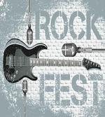 Guitar on Brick Wall