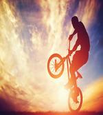 Man on Bike Hazy Sun