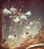 UFOs in Cloudy Sky