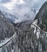 Highway in Winter Forest