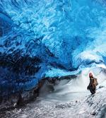Traveler Man in Ice Cave