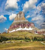 Rugged Peak and Cloudy Sky