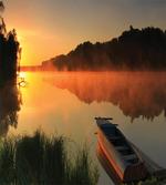 Boat on Misty Shoreline