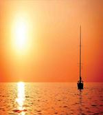 Lonely Yacht at Sunset
